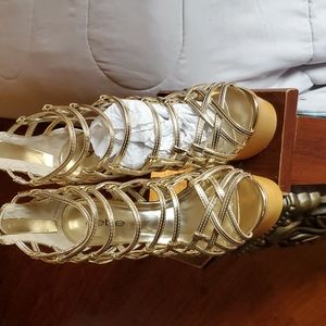 beautiful  gold  wedges  in gold  from Bebe size 7
